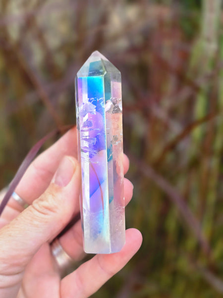 Aura quartz ( slightly damaged to the point )