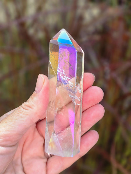 Aura quartz ( slightly damaged to the point )