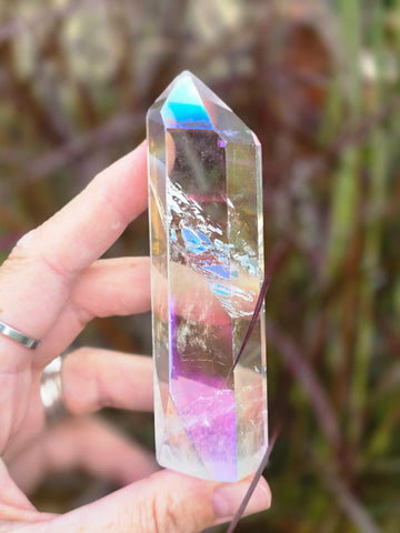 Aura quartz ( slightly damaged to the point )
