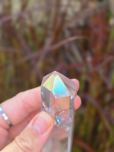 Aura quartz ( slightly damaged to the point )