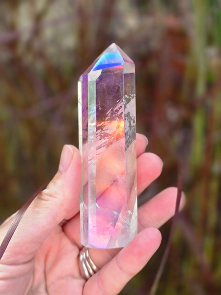Aura quartz ( slightly damaged to the point )