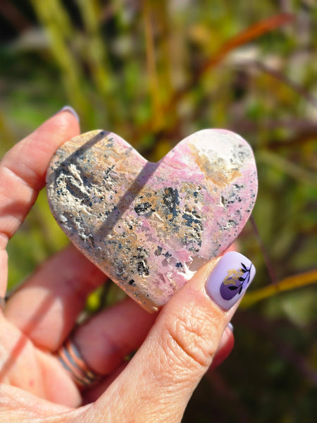 Rhodonite with pyrite heart