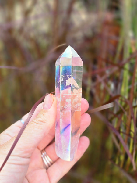 Aura quartz ( slightly damaged to the point )